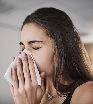 Photo of woman sneezing - Sinus